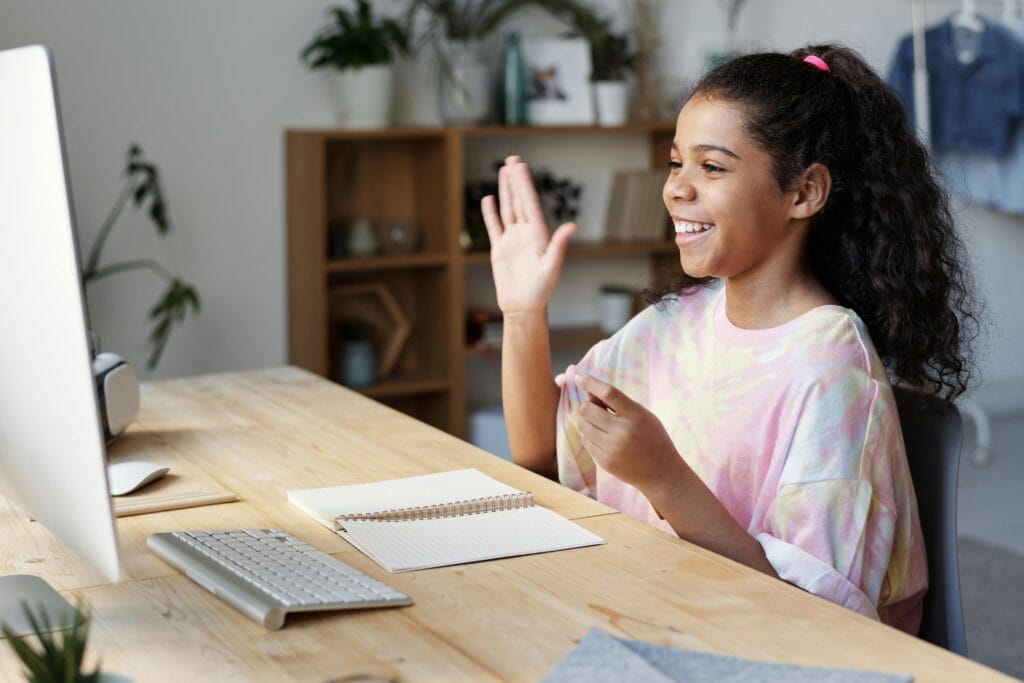 teenager greeting computer